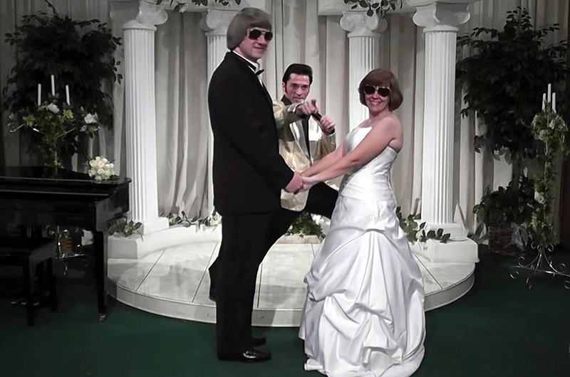In this Oct. 29, 2011, image made from a video provided by A Elvis Chapel, David Allen Turpin, left, and his wife, Louise Anna Turpin, right, celebrate a renewal of their wedding vows with Elvis impersonator Kent Ripley in Las Vegas. The couple was arrested Sunday, Jan. 14, 2018, after authorities found their malnourished children in their home in suburban Perris, Calif., 60 miles (96 kilometers) southeast of Los Angeles. The couples' children were so emaciated the older ones still looked like children. (A Elvis Chapel via AP)