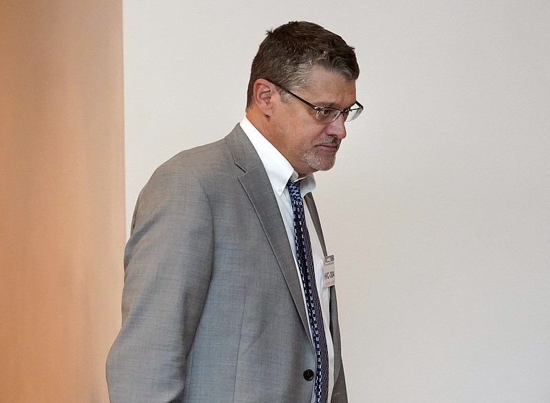 FILE - In this Nov. 14, 2017, file photo, Glenn R. Simpson, co-founder of the research firm Fusion GPS, arrives for a scheduled appearance before a closed House Intelligence Committee hearing on Capitol Hill in Washington. A congressional committee has released a transcript of a private interview with Simpson, the co-founder of the political opposition research firm that commissioned a dossier of allegations involving President Donald Trump’s ties to Russia. (AP Photo/Pablo Martinez Monsivais, File)