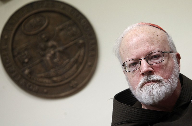 FILE - In this Feb. 16, 2015 file photo, head of the sex abuse advisory commission Cardinal Sean Patrick O'Malley, of Boston, attends a press conference, in Rome. O'Malley, Pope Francis’ top adviser on clerical sex abuse, implicitly rebuked the pontiff over his accusations of slander against Chilean abuse victims, saying Saturday, Jan. 20, 2018, that his words were “a source of great pain for survivors of sexual abuse.” (AP Photo/Isabella Bonotto, File)