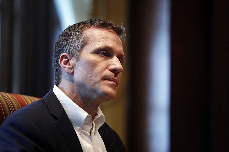 Missouri Gov. Eric Greitens listens to a question during an interview in his office at the Missouri Capitol Saturday, Jan. 20, 2018, in Jefferson City, Mo. (AP Photo/Jeff Roberson)