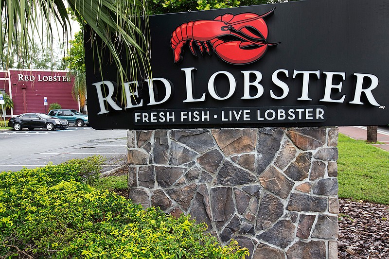 This Tuesday, Sept. 13, 2016, file photo, shows a Red Lobster restaurant in North Miami, Fla. Red Lobster CEO Kim Lopdrup says the company has updated its kitchens and plans to grow its worldwide restaurant count from 750 to 1,000 in the next decade. (AP Photo/Wilfredo Lee, File)