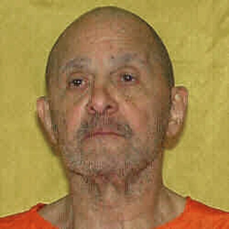 FILE - This undated file photo provided by the Ohio Department of Rehabilitation and Correction shows death row inmate Alva Campbell, convicted of fatally shooting Charles Dials of Columbus, Ohio, during a carjacking after Campbell escaped from police custody during a 1997 court appearance in Columbus, Ohio. In a January 2018 court filing, Campbell's attorneys once again recommended a firing squad as an alternative to lethal injection, after the state couldn't find a usable vein during an attempt to execute Campbell on Nov. 15, 2017, that was stopped after 25 minutes of unsuccessful needle sticks. (Ohio Department of Rehabilitation and Correction via AP, File)