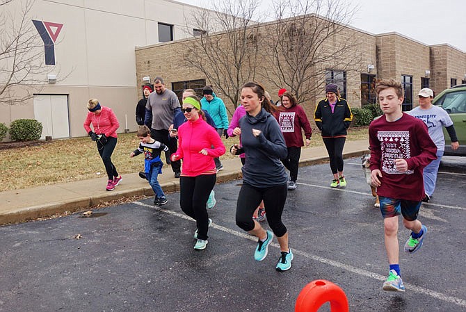 About 20 human runners — and one dog — set off on the Callaway YMCA's second annual Hot Cocoa Hustle 5K on Saturday afternoon. According to YMCA marketing and event director Beth Oseroff, many runners participated alongside family members.