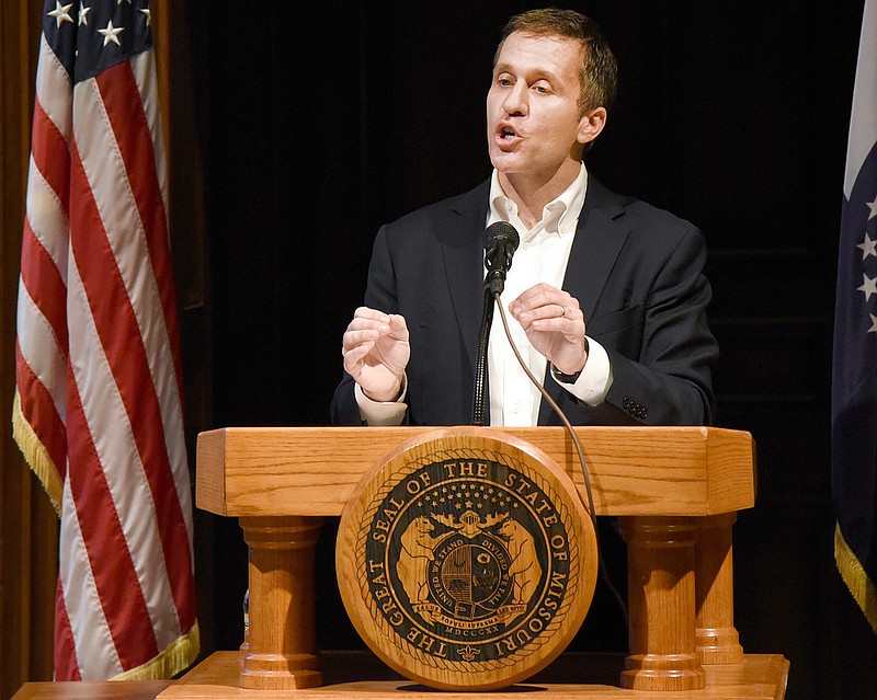 Missouri Gov. Eric Greitens takes questions on the new state budget Monday during a press conference at the State Capitol. When asked questions about his affair, Greitens responded by saying he had already addressed questions pertaining to that issue and he and his wife were moving forward.