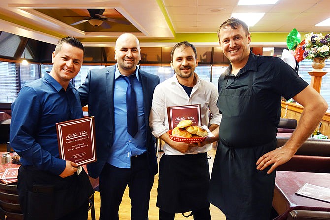 Alexandro, owner/chef Antonio, Roberto and Michangelo Berlusconi opened Fulton's newest restaurant, Bella Vita, on Sunday. Originally hailing from Venice, Italy, the family hopes to bring authentic Italian food to Callaway County.