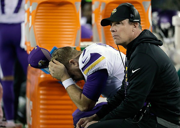Vikings quarterback Case Keenum reacts on the bench beside offensive coordinator Pat Shurmur during the second half of Sunday's NFC championship game against the Eagles in Philadelphia.