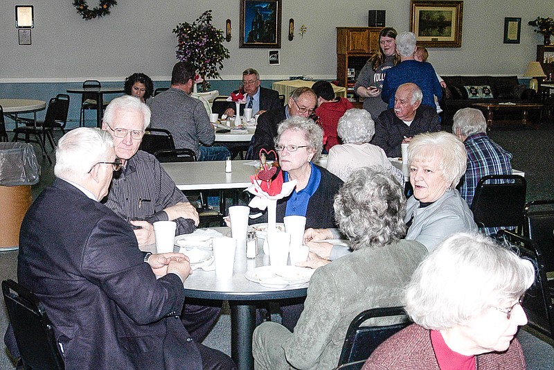 <p>Democrat photo / David A. Wilson</p><p>Area residents enjoy a ham and turkey meal, and support the California Nutrition Center at the fundraiser dinner on Sunday.</p>