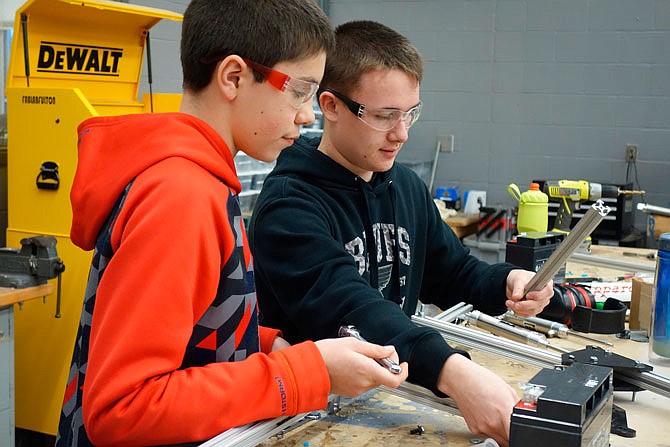 Jacob Moak and Nathan Lowry, both freshmen, are members of Fulton High School's Robotics team. They are part of a group preparing a robot for a national competition March 8-10 hosted by St. Louis University.