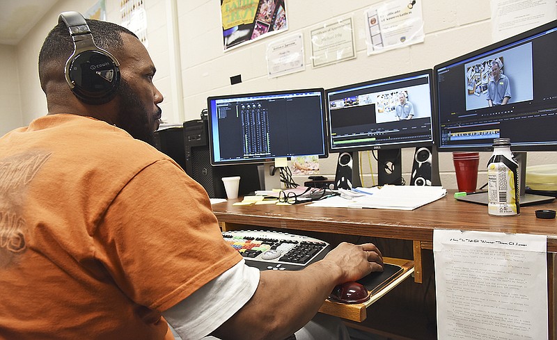 Michael Irby works at the computer where he's working on editing and animation techniques. Irby is one of four offenders who work at least five days a week in Jefftown Productions, a video production section at Jefferson City Correctional Center.