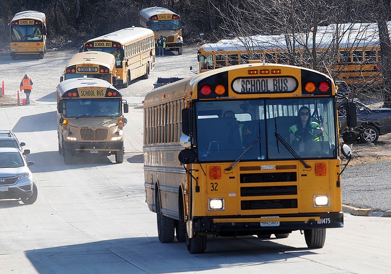 School buses start to leave First Student Inc. on Friday, Jan. 26, 2018, for their daily run to pick up Jefferson City Public Schools students from school.