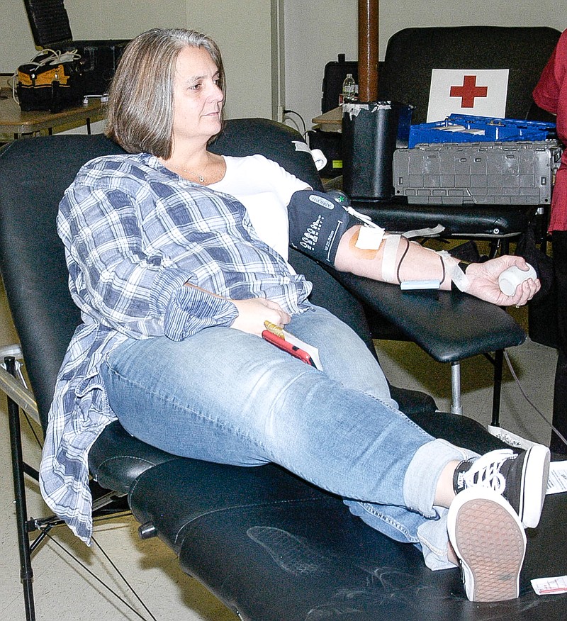 <p>Democrat photo / David A. Wilson</p><p>Anna Hall participates in an American Red Cross Blood Drive, hosted at St. Paul’s Lutheran Church, Jan. 25. The drive brought in 25 units to help provide blood during a shortage due, at least in part, to weather-related issues.</p>