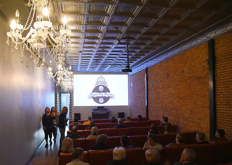 People make their way into the auditorium to pick seats before the showing of the film "Lady Bird" at Capitol City Cinema on Saturday, Jan. 27, 2018. 