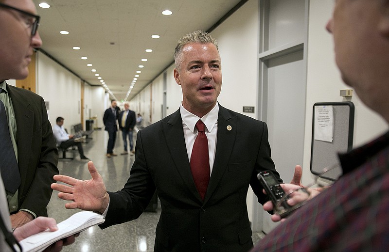 FILE - In this Sept. 22, 2017 file photo, Republican gubernatorial candidate Assemblyman Travis Allen, R-Huntington Beach, discusses a judge's ruling in Sacramento, Calif. Documents released Friday, Feb. 2, 2018, by the California Legislature show four current lawmakers faced sexual misconduct complaints since 2006. The documents outline complaints against Democratic Assemblywoman Autumn Burke of Los Angeles, Republican Assemblyman Travis Allen of Huntington Beach, Democratic Sen. Tony Mendoza of Artesia and Democratic Sen. Bob Hertzberg of Van Nuys. (AP Photo/Rich Pedroncelli, File)