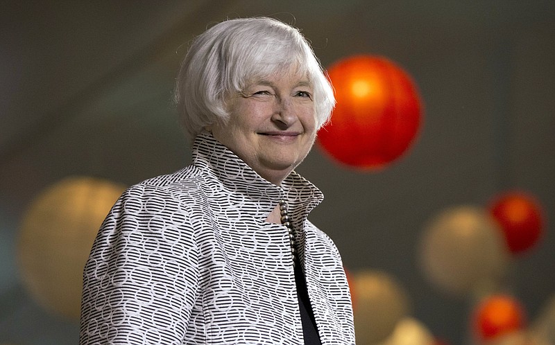 FILE - In this Friday, May 5, 2017, file photo, Federal Reserve Chair Janet Yellen smiles before giving a speech during a conference at Brown University in Providence, R.I. Yellen's last day at the Fed is Friday, Feb. 2, 2018. Then she will start a new job on Monday, Feb. 5 at the Brookings Institution. (AP Photo/Michael Dwyer, File)