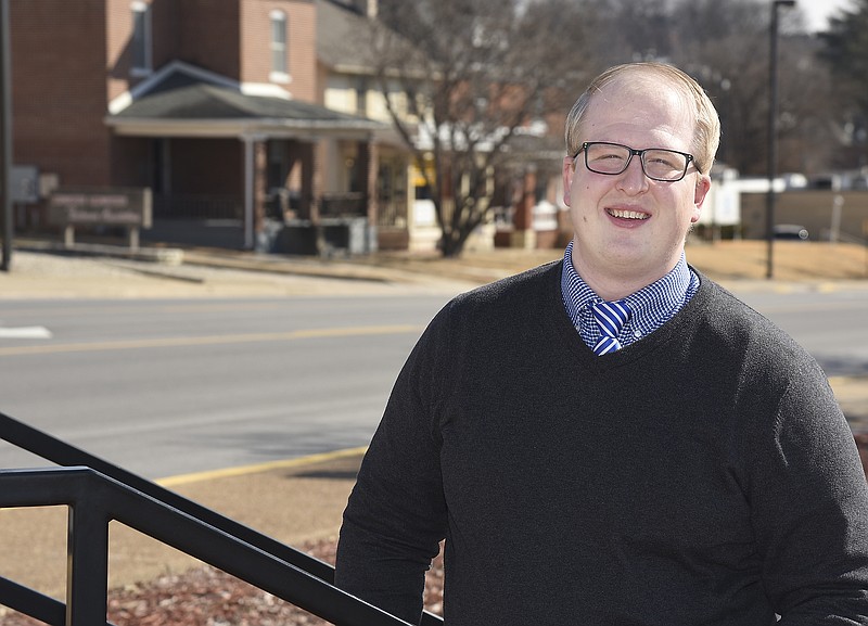 Julie Smith/News Tribune
Ian Zollinger poses outside of the Jefferson City Municipal Building Wednesday. Zollinger is the new Planner 1 with the Jefferson City Planning and Protective Services Department. 