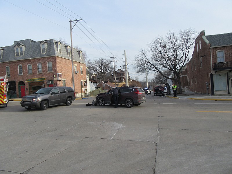 Two people were taken into custody following a police pursuit that ended with a vehicle collision at Bolivar and West Main streets in Jefferson City on Friday, Feb. 9, 2018.