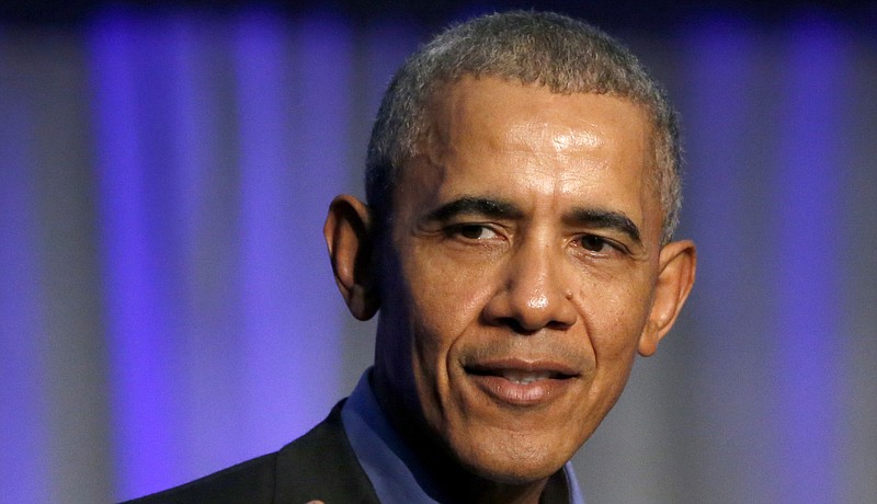 In this Dec. 5, 2017, file photo, former President Barack Obama address the participants at a summit on climate change involving mayors from around the globe in Chicago. A Democratic group backed by former President Barack Obama plans to invest millions of dollars in state-level elections in a dozen states this year, with its heaviest focus on Ohio. (AP Photo/Charles Rex Arbogast, File)