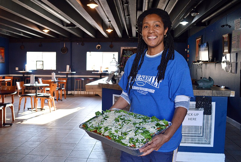 Philllippia Rome, owner of The Blue Skillet, with her vegetable lasagna. She is one of several black members of the community to say it can be hard for people of color to work in Jefferson City's existing business climate. 