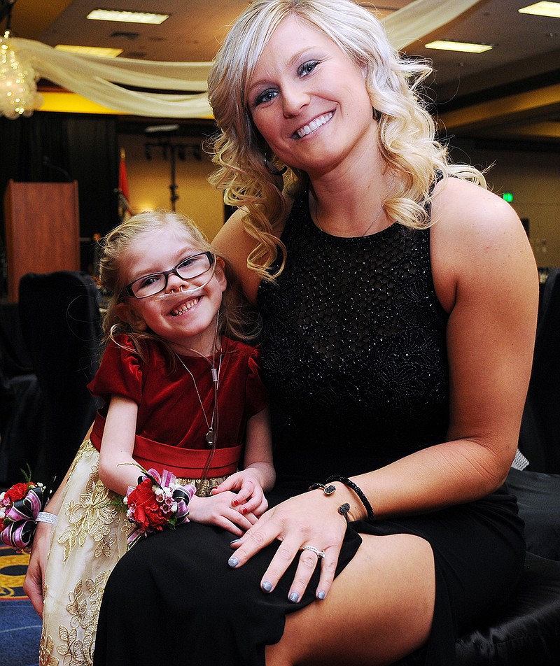 Jessica Hummel and her 5-year-old daughter, Harper, pose for a photo at the Mid-Missouri Heart Ball. Harper is the 2018 Heart Child.