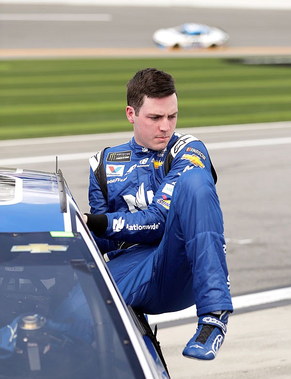 Alex Bowman climbs out of this car after Sunday's qualifying for the NASCAR Daytona 500 race at Daytona International Speedway in Daytona Beach, Fla.