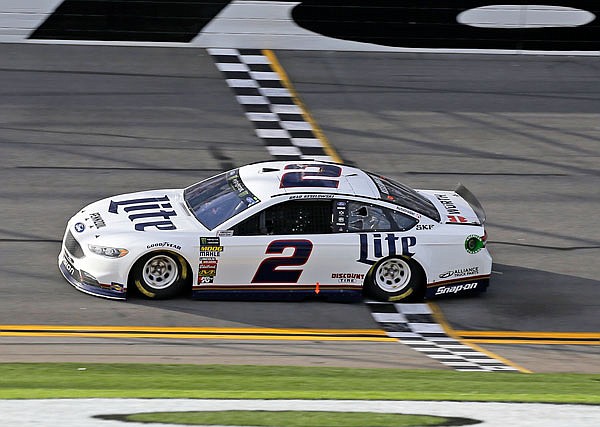 Brad Keselowski crosses the finish line to win the NASCAR Clash on Sunday at Daytona International Speedway in Daytona Beach, Fla.