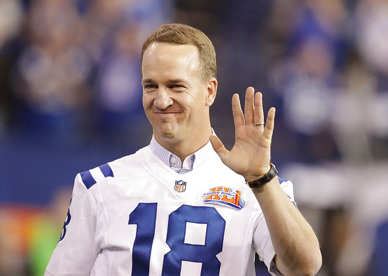 In this Nov. 20, 2016, file photo, former Indianapolis Colts quarterback Peyton Manning claps as the team honored the 2006 Super Bowl winning team during half time of an NFL football game in Indianapolis. Peyton Manning is leading one more drive on a huge stage. The two-time Super Bowl-winning quarterback will serve as honorary pace car driver for the 60th running of the Daytona 500. (AP Photo/Darron Cummings, File)