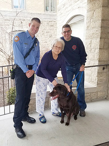 Following a fire at her home, Balanca Acosta could no longer care for her 3-year-old chocolate lab, Chance. Recently, Jefferson city Fire Department Assistant Chief Tim Grace adopted Chance and the pair visited Acosta at St. Joseph's Bluffs assisted living facility.