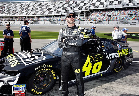 Jimmie Johnson looks up at the leaderboard during Sunday's qualifying for the Daytona 500 at Daytona International Speedway in Daytona Beach, Fla.