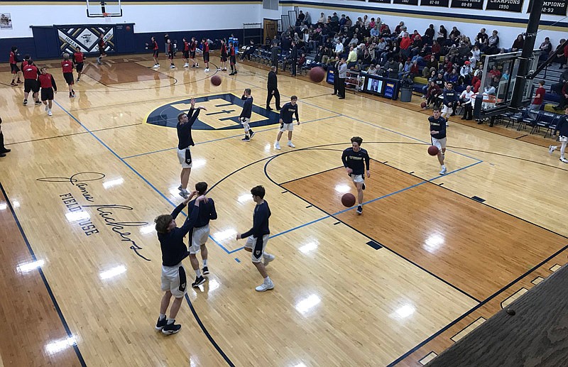 During Senior Night on Tuesday, Feb. 13, 2018 at Rackers Fieldhouse, Helias players warm up to host Southern Boone in the final boys home game of the Crusaders' season.