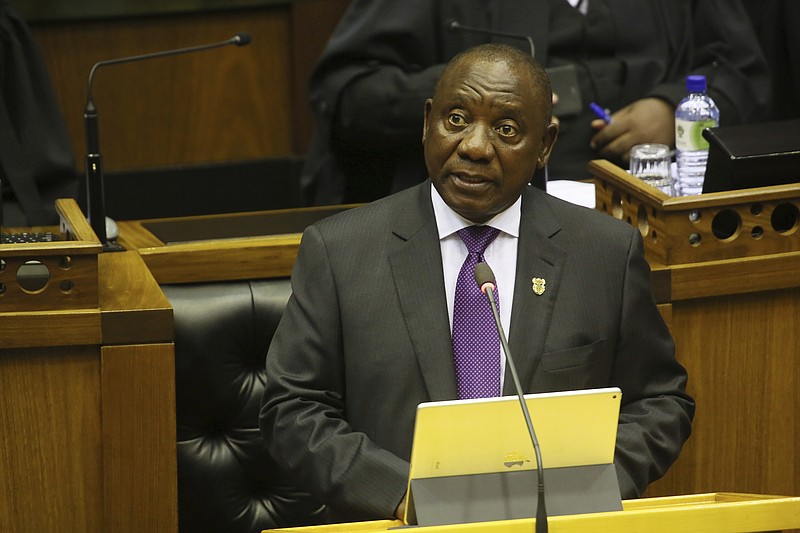 South Africa's new President, Cyril Ramaphosa, delivers his State of the Nation address in parliament in Cape Town, South Africa, Friday, Feb. 16, 2018. There are high expectations for Ramaphosa to curb corruption that flourished under his predecessor Jacob Zuma who resigned earlier in the week. (AP Photo/Ruvan Boshoff)