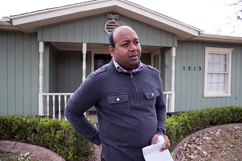 Janson Abraham, pastor of Kingdom Acts Ministries International, speaks to the media outside his home, which is also the location where many of the ministry services are held, Thursday, Feb. 8, 2018, in Corpus Christi, Texas. One man has died after he and several others were stabbed during a church service at a private home in Texas, police said Thursday. As many as 20 people were in the home Wednesday night when an apparent member of the congregation pulled a knife and stabbed four men, said Corpus Christi police Lt. Chris Hooper. (Rachel Denny Clow/Corpus Christi Caller-Times via AP)