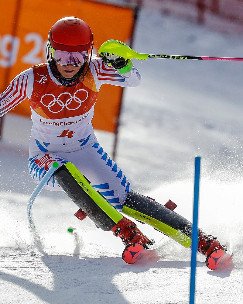 Mikaela Shiffrin, of the United States, skis during the first run of the women's slalom at the 2018 Winter Olympics in Pyeongchang, South Korea, Friday, Feb. 16, 2018. (AP Photo/Michael Probst)