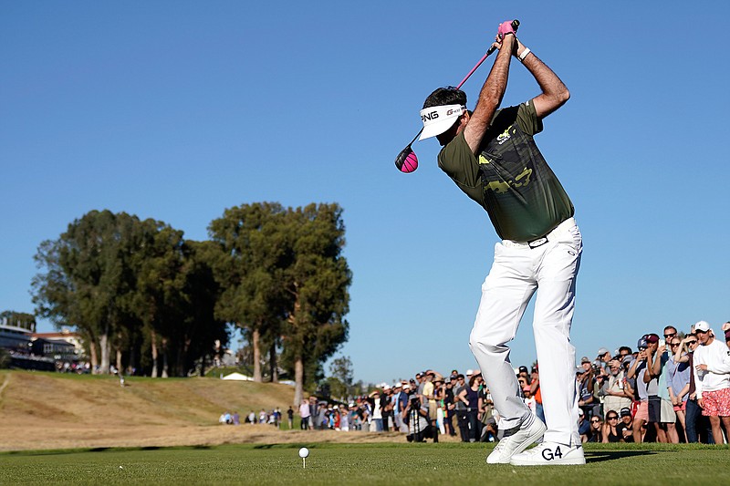 Bubba Watson tees off on the 18th hole during the third round of the Genesis Open golf tournament at Riviera Country Club, Saturday, Feb. 17, 2018, in the Pacific Palisades area of Los Angeles. (AP Photo/Ryan Kang)