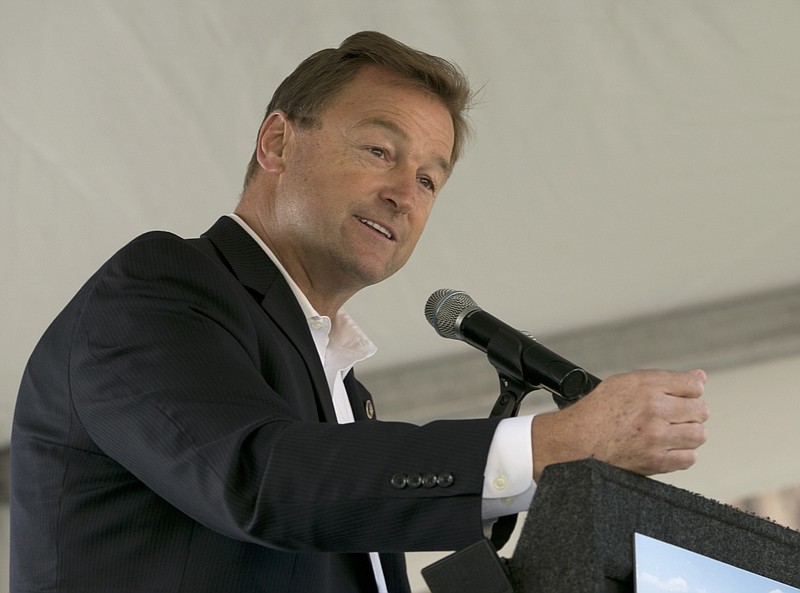 FILE - In this Aug. 22, 2017, file photo Sen. Dean Heller, R-Nev. speaks at the 21st Annual Lake Tahoe Summit in South Lake Tahoe, Calif. When Ivanka Trump assembled a group of Republican senators at her Washington home in the fall of 2017, the guest list included one particularly notable name, Heller. But within weeks of dining with the president’s daughter and adviser, Heller, who is up for re-election in 2018, was working closely with the White House, writing part of the Republican tax bill doubling the tax credit for families with children.(AP Photo/Rich Pedroncelli)