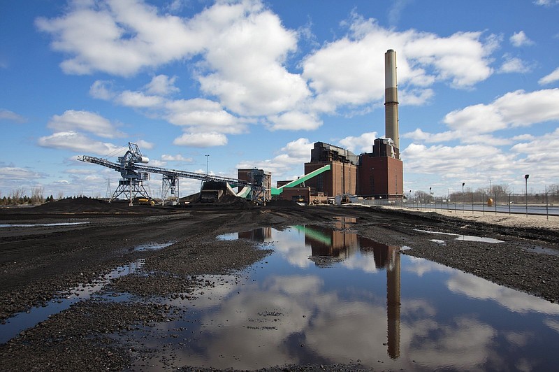 FILE - In this April 12, 2016, file photo, the B.C. Cobb Plant, which closed April 15, 2016 is shown in Muskegon, Mich. A major Michigan utility says it will reduce carbon emissions by 80 percent and no longer use coal to generate electricity by 2040. Consumers Energy is the second state utility to announce it's phasing out coal as it switches more to cleaner and renewable sources. (Joel Bissell//Muskegon Chronicle via AP, File)