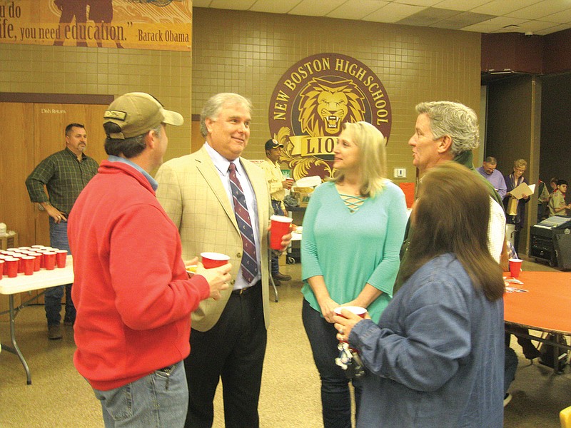 Fifth District Court Judge Bill Miller, Bowie County Court at Law Judge Jeff Addison, County Clerk Tina Petty, District Attorney Jerry Rochelle and County Treasurer Donna Burns talk Saturday during the county's Meet the Candidates and Straw Poll event. (Staff photo by Greg Bischof)