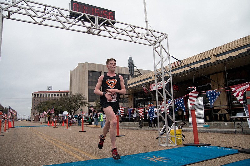 Nathan Hall, 33, of Monroe, La., was the winner of the Run The Line half-marathon on Sunday, Feb. 18, 2018, in downtown Texarkana.
