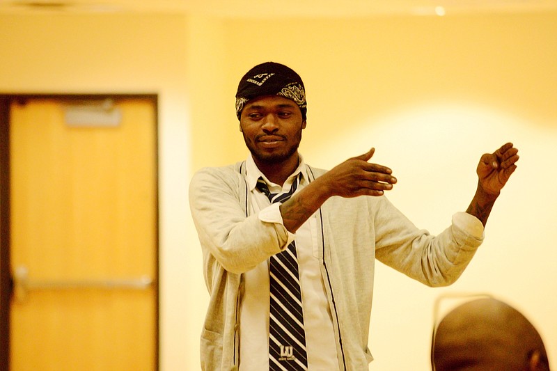 Jaylin Jones, director for the upcoming play “A Night in Harlem,” talks to performers Feb. 8 during a rehearsal at Lincoln University. The performance will feature a collaboration of artistic reflections of the Harlem Renaissance era expressed through soulful music, poetry and dancing at 7 p.m. Friday in Mitchell Auditorium.