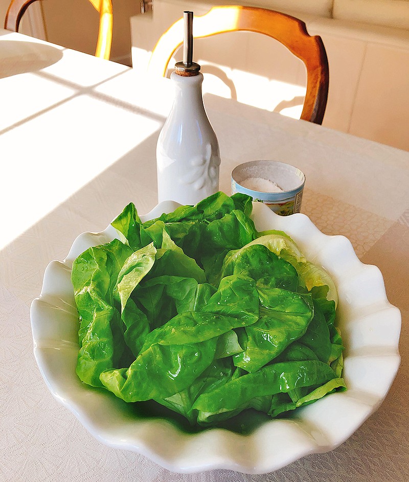 This Feb. 14, 2018 photo provided by Elizabeth Karmel shows her three-ingredient Luxurious Lettuce Salad, in Amagansett, N.Y. This salad is deceptively simple but relies on the absolute best ingredients for it to be a success. That is, fresh butter lettuce, fleur de sel sea salt, and your favorite first-press extra-virgin olive oil. (AP Photo/Elizabeth Karmel)