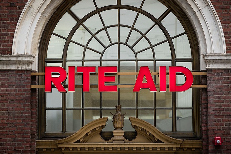 This Oct. 21, 2016 file photo shows a Rite Aid location in Philadelphia. The privately held owner of Safeway, Vons and other grocery brands is plunging deeper into the pharmacy business with a deal to buy Rite Aid, the nation's third-largest drugstore chain. Albertsons Companies is offering either a share of its stock and $1.83 in cash or slightly more than a share for every 10 shares of Rite Aid. A deal value was not disclosed in a statement released Tuesday, Feb. 20, 2018,  by the companies. (AP Photo/Matt Rourke)