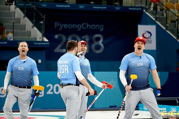 United States teammates (from left) Tyler George, John Landsteiner, John Shuster and Matt Hamilton celebrate after defeating Canada in a men's curling semifinal Thursday at the Winter Olympics in Gangneung, South Korea.