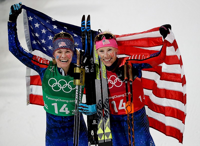  United States' Jessica Diggins, left, and Kikkan Randall celebrate after winning the gold medal in the women's team sprint freestyle cross-country skiing final at the 2018 Winter Olympics on Wednesday in Pyeongchang, South Korea.