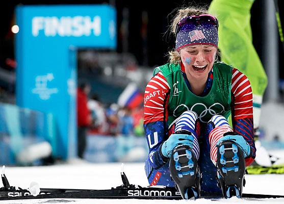 Jessica Diggins of the United States celebrates Wednesday after winning the gold medal in women's team sprint freestyle cross-country skiing in Pyeongchang, South Korea.