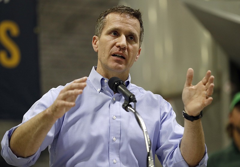 FILE - In this Jan. 29, 2018, file photo, Missouri Gov. Eric Greitens speaks in Palmyra, Mo. A St. Louis grand jury has indicted Greitens on a felony invasion of privacy charge related to the Republican's affair with a woman in 2015. St. Louis Circuit Attorney Kim Gardner announced the indictment Thursday, Feb. 22, 2018. She launched an investigation in January after Greitens admitted to an affair with his St. Louis hairdresser that began in March 2015. He was elected governor in November 2016. (AP Photo/Jeff Roberson, File)