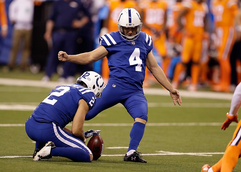In this Thursday, Dec. 14, 2017 file photo,Indianapolis Colts kicker Adam Vinatieri (4) kicks a field goal from the hold of Rigoberto Sanchez during the first half of an NFL football game against the Denver Broncos in Indianapolis. Adam Vinatieri has signed a one-year contract extension with the Indianapolis Colts. And at 45 he could break the NFL's career scoring record next season. Financial details were not immediately available Thursday, Feb. 22, 2018 but he made $3 million last season. (AP Photo/Darron Cummings, File)