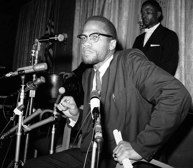 In this Feb. 13, 1963 file photo, Nation of Islam leader Malcolm X speaks to the press in New York as Muslims were picketing through the Times Square area. A Smithsonian Channel series, "The Lost Tapes: Malcolm X," examining the life of civil right leader Malcolm X, follows the advocate's changing philosophy using his own words as a Nation of Islam surrogate to a figure seeking to build coalitions during the tumultuous 1960s civil rights era.  (AP Photo/Marty Lederhandler, File)