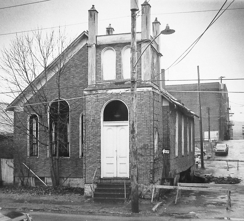 This March 28, 1984 photo shows the former Bethel AME Church shows the building's collapsed foundation in Waynesburg, Pa. William Davidson wrote a letter last year to Waynesburg council requesting an honorific for the church, which was demolished in 1984, just a year before its 100th anniversary. The foundation was beginning to collapse, and the building sat unused for several years before it was torn down. (Observer-Reporter via AP)