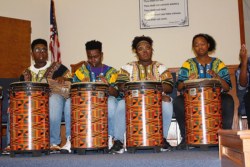 Members of the Scholars group perform on drums Saturday at the 27th annual Youth Rally sponsored by Twin City Black History Association at Hickory Hill Baptist Church in Nash, Texas. "Every year, this is a time to get our youth together where they can showcase their talents. Whatever their talent is, this is an opportunity for them to show off, and it's 
a good time for them to come together and fellowship and do something good," association chairwoman Wanda Davis said.