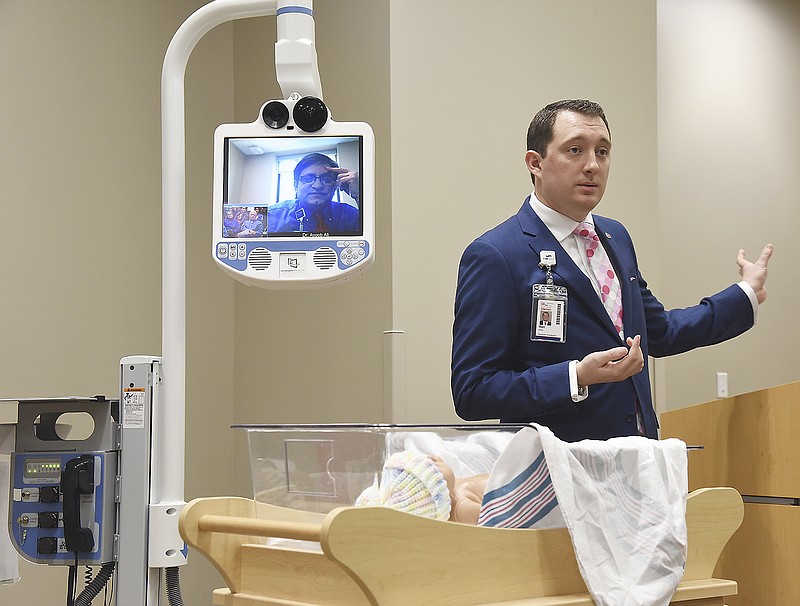 Matt Dietz of Cardinal Glennon Children's Hospital's Pediatric Telehealth describes how telemedicine can benefit patients and their families Monday during a demonstration at St. Mary's Hospital.