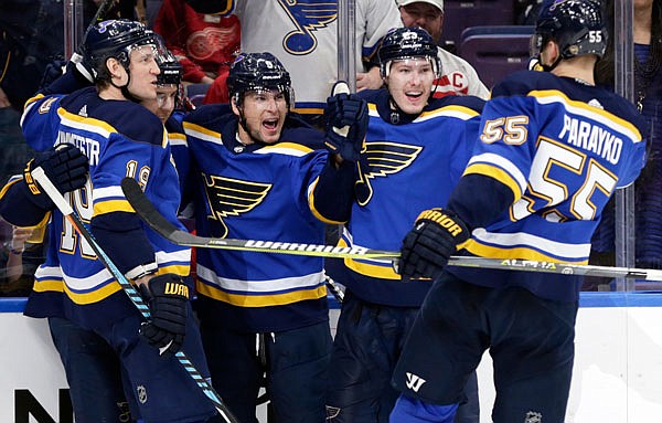 Scottie Upshall (center)  celebrates his goal with Blues teammates Colton Parayko (55), Dmitrij Jaskin (23), Jay Bouwmeester (19) and Brayden Schenn in the second period of Wednesday night's game against the Red Wings in St. Louis.